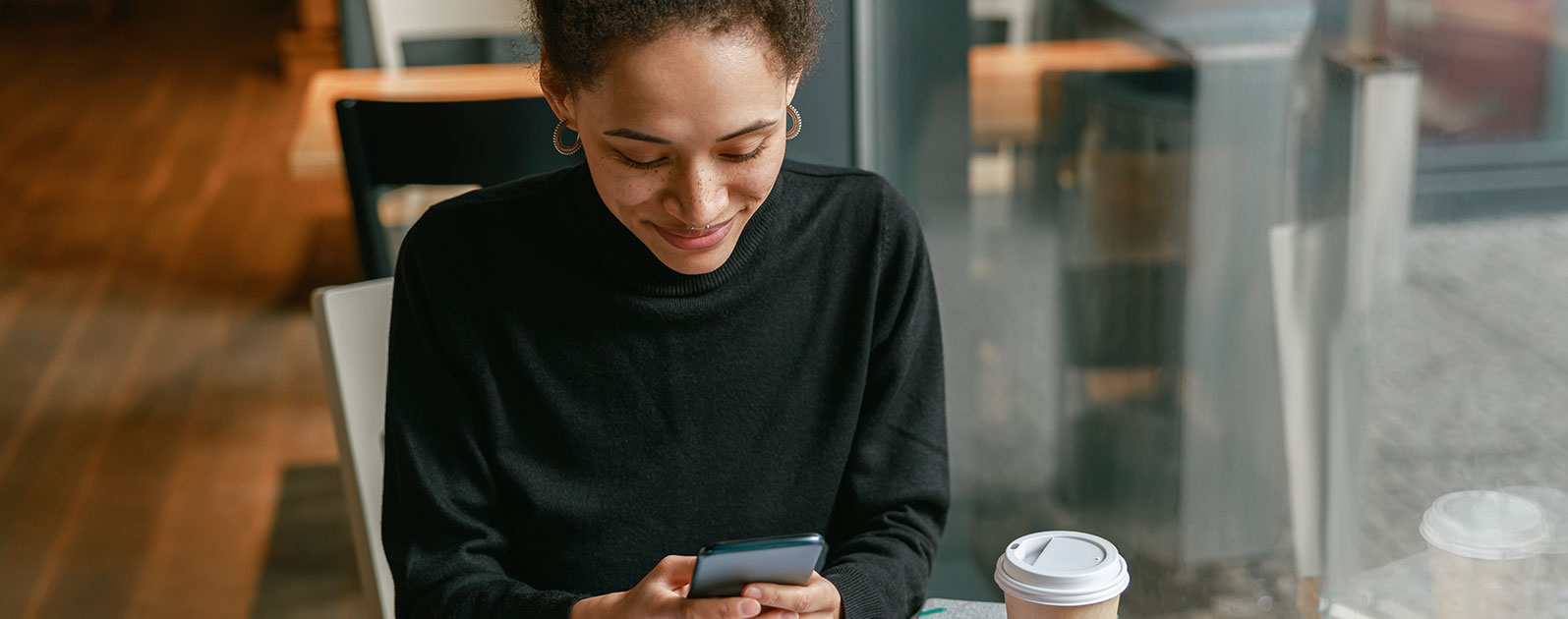 Woman reading Connects Contacts email